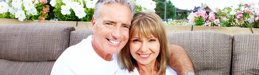 Dentist Senior Couple Outside Smiling CS1