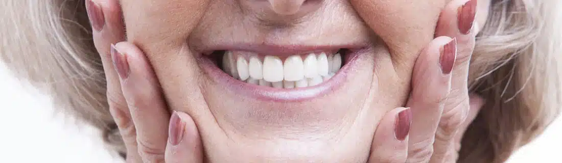 Dentist Senior Woman With Dentures Smiling Closeup CS1