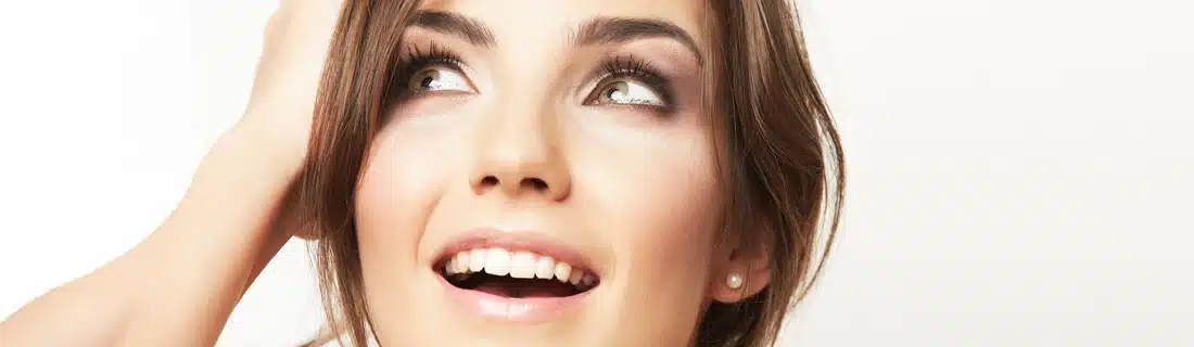 Woman Hand On Head Smiling CS1